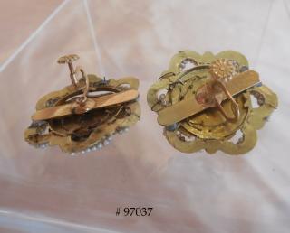 Back shows evidence how, over several hundred years, these were preserved & eventually converted to earrings