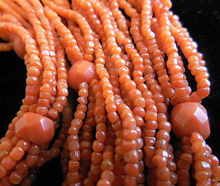 52" SAUTOIR of Sciacca Coral Beads, six strands with large hand-faceted spacer beads