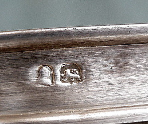 Small components, per English law, marked with monarch (George III) and lion passant