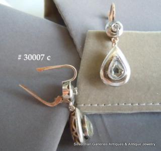 Rose gold ear wire opens on a hinge