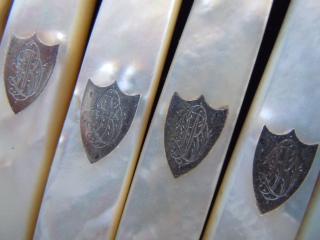 Detail, inlaid silver shields
