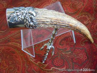 9" long, sterling cap to tip of horn