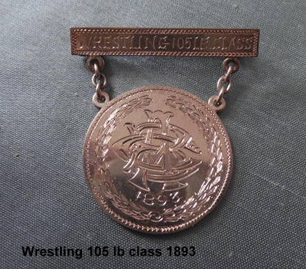 WRESTLING 105 LB CLASS (hand engraved on bar)