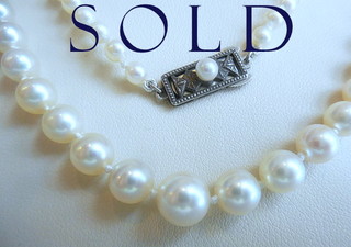 MIKIMOTO 21" graduated matinee length pearl strand