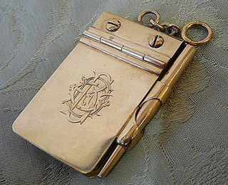 ASPREY. Bond Street, London, gold miniature notepad/mechanical pencil compendiumComing Soon