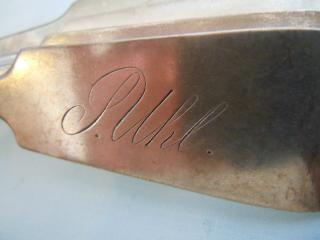 "P Uhl" engraved on a table spoon