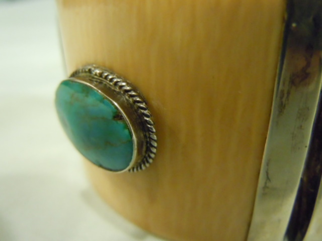 Turquoise, and its setting, detail