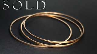 SET OF THREE HEAVY square profile 18K gold circular hoop bracelets