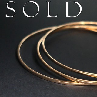 SET OF THREE HEAVY square profile 18K gold circular hoop bracelets