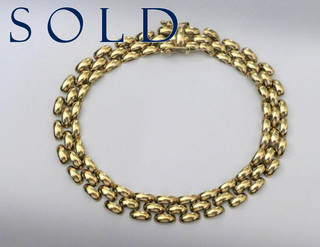 "PANTHER" LINKS Triple Row Gold Bracelet