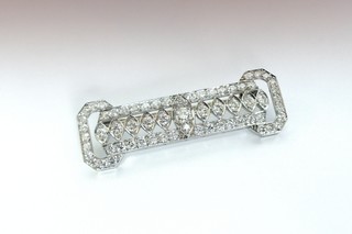 SIXTY-THREE DIAMONDS IN PLATINUM, a choice and perfect art deco brooch