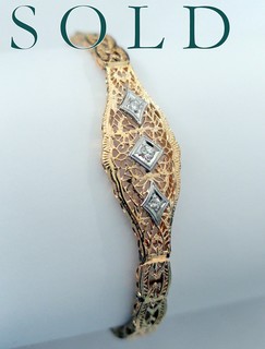 THREE DIAMONDS YELLOW GOLD BRACELET OF LACY OPENWORK