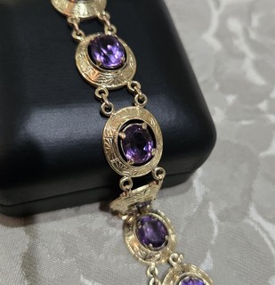SEVEN OVAL FACETED AMETHYSTS BRACELET