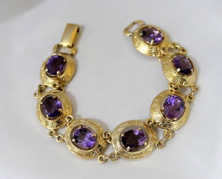 SEVEN OVAL FACETED AMETHYSTS BRACELET