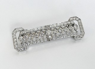 SIXTY-THREE DIAMONDS IN PLATINUM, a choice and perfect art deco brooch