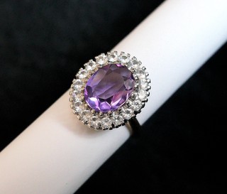 OVAL AMETHYST in halo of White Sapphire brilliants