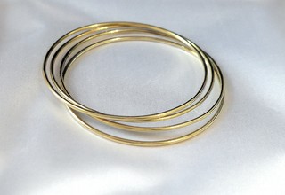 SET OF FOUR 14k hand-made circular hoop bangle bracelets