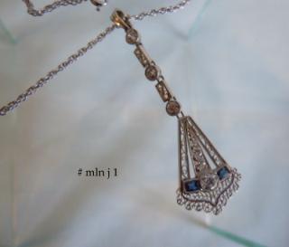 Pendant : tested platinum; length : 2”