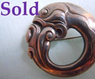 "Baby Dolphin" brooch, an early example, Georg Jensen # 10