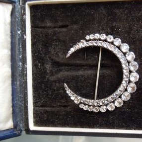 Large crescent pins were popular for wear on a turban in the early 1800's