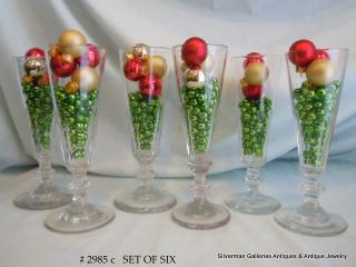 Six 7" blown and cut glass Georgian flutes