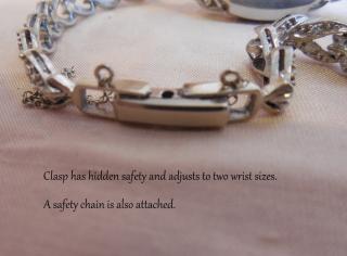Clasp, adjustable & with internal safety plus safety chain