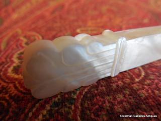 Detail, carved Mother of Pearl handle