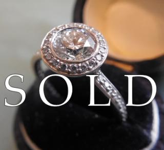 "HALO" DIAMOND RING, 1.15 carats total