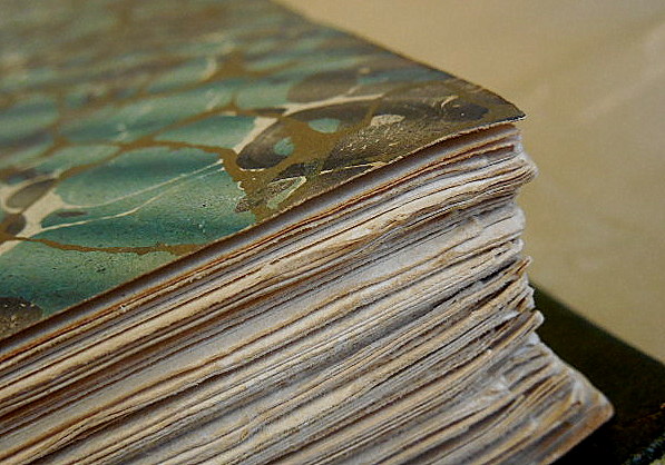 Marbled endpapers and deckle fore-edge