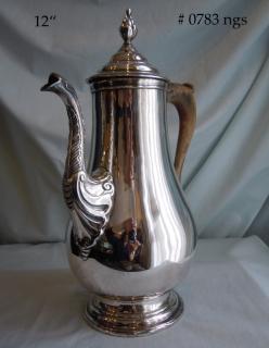 Simple pear-shape body, elegant Rococo spout, finial and handle terminals